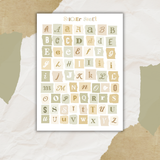 colorful paper scraps alphabet sticker sheet