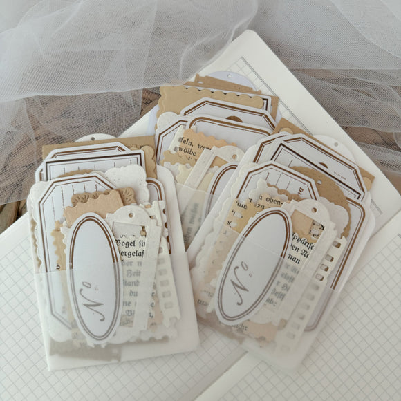 mixed paper ephemera and sticker cut outs pocket, 24 pieces